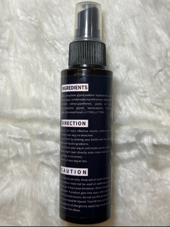 Back label of Lux Hair Essentials Lace Tint Spray bottle showing ingredients, directions, and caution instructions on a black background with white text.