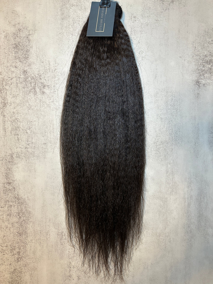Raw Kinky Straight Clip-In Ponytail Extension – natural black, 100% raw Cambodian hair, thick texture, displayed with product tag.